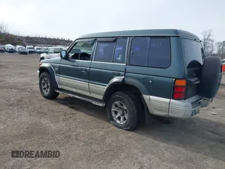 1995 Mitsubishi Montero z VIN JA4MR41H7SJ010597, wystawiony jako IAAI lot #41610885 z przebiegiem 162 406 mil mil oraz . Historia ofert i sprzedaży dostępna na DreamBid. Obrazek 3.