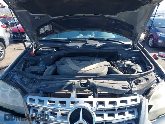 2010 Mercedes-Benz M 350 with VIN 4JGBB5GB0AA570448, listed as a IAAI auction lot 41911210 with 166,489 mi miles and . Bid and sale history available at DreamBid. Image 10.