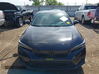 2023 Honda Civic Sport with VIN 2HGFE2F58PH557787, listed as a IAAI auction lot 42207827 with 51,885 mi miles and . Bid and sale history available at DreamBid. Image 12.