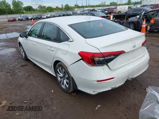 2024 Honda Civic LX z VIN 2HGFE2F20RH523593, wystawiony jako IAAI lot #42213468 z przebiegiem 13 561 mil mil oraz . Historia ofert i sprzedaży dostępna na DreamBid. Obrazek 3.