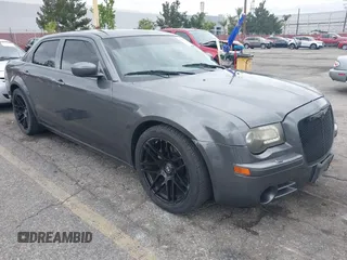 2006 Chrysler 300 C with VIN 2C3LA63H16H209495, listed as a IAAI auction lot 42053393 with 125,997 mi miles. Bid and sale history available at carsss.com. Image 1.