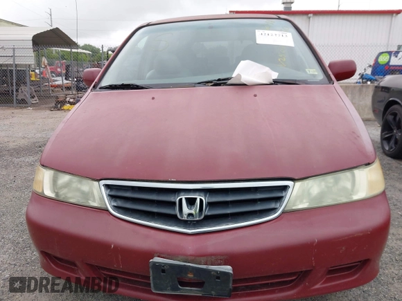 2002 Honda Odyssey EX-L z VIN 2HKRL18092H572036, wystawiony jako IAAI lot #42122713 z przebiegiem Nie podano mil oraz . Historia ofert i sprzedaży dostępna na DreamBid. Obrazek 10.
