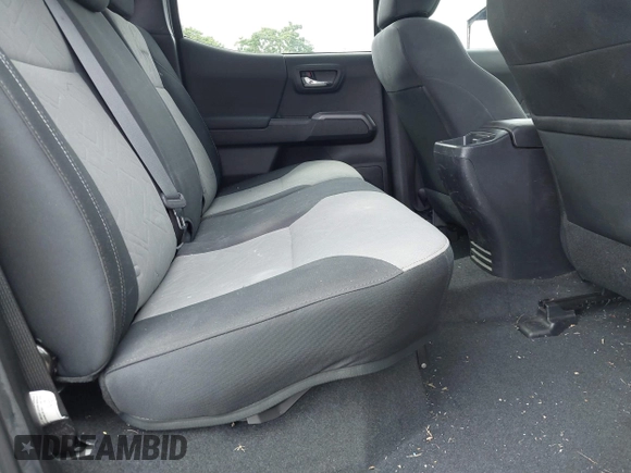 2023 Toyota Tacoma SR5 z VIN 3TYDZ5BNXPT024914, wystawiony jako IAAI lot #41302756 z przebiegiem 20 307 mil mil oraz . Historia ofert i sprzedaży dostępna na DreamBid. Obrazek 8.