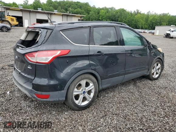 2014 Ford Escape SE with VIN 1FMCU9GX7EUB52765, listed as a Copart auction lot 57563305 with 187,203 mi miles and Salvage title. Bid and sale history available at DreamBid. Image 3.