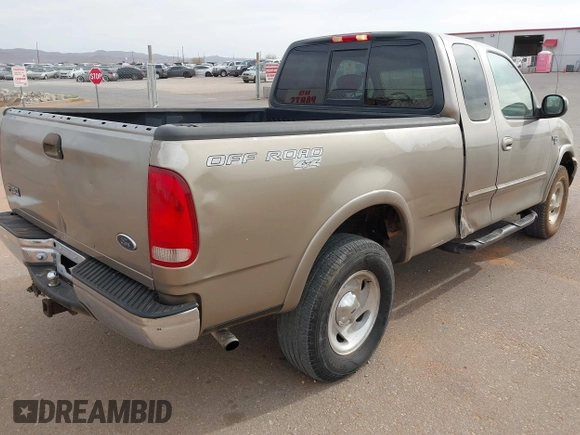 2001 Ford F-150 XL with VIN 2FTRX18L61CA36907, listed as a IAAI auction lot 41906933 with 317,857 mi miles. Bid and sale history available at carsss.com. Image 4.