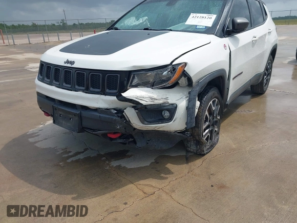 2020 Jeep Compass Trailhawk with VIN 3C4NJDDB3LT118928, listed as a IAAI auction lot 42128120 with 95,477 mi miles and . Bid and sale history available at DreamBid. Image 6.