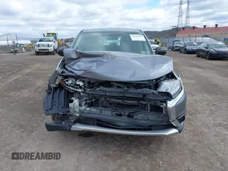 2018 Mitsubishi Outlander ES z VIN JA4AZ3A36JJ004547, wystawiony jako IAAI lot #42048456 z przebiegiem 82 379 mil mil oraz . Historia ofert i sprzedaży dostępna na DreamBid. Obrazek 13.