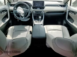 2021 Toyota RAV4 Hybrid LE with VIN 4T3B6RFV8MU056574, listed as a Copart auction lot 56977735 with 19,032 mi miles and Salvage title. Bid and sale history available at DreamBid. Image 8.