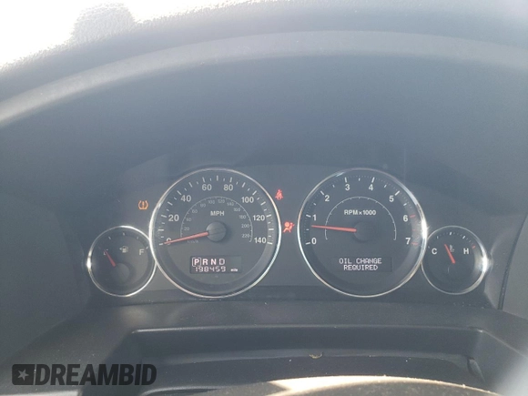 2008 Jeep Commander Sport z VIN 1J8HG48K38C180234, wystawiony jako Copart lot #55959325 z przebiegiem 198 459 mil mil oraz Szkoda całkowita • Salvage title. Historia ofert i sprzedaży dostępna na DreamBid. Obrazek 9.