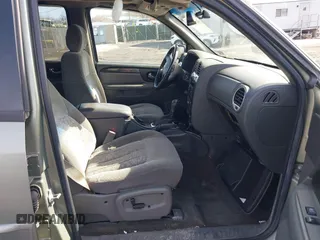 2004 GMC Envoy SLE with VIN 1GKDT13S942254932, listed as a IAAI auction lot 41509407 with 213,068 mi miles. Bid and sale history available at carsss.com. Image 5.
