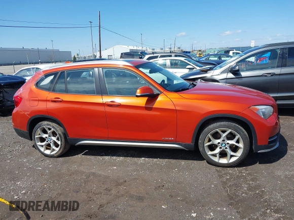 2015 BMW X1 xDrive28i with VIN WBAVL1C57FVY27822, listed as a IAAI auction lot 41977545 with 76,211 mi miles. Bid and sale history available at carsss.com. Image 13.