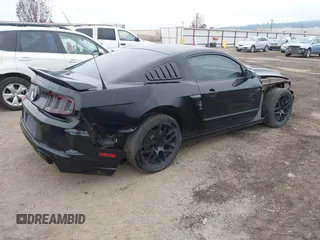 2013 Ford Mustang GT with VIN 1ZVBP8CF3D5240409, listed as a IAAI auction lot 41022550 with 133,744 mi miles. Bid and sale history available at carsss.com. Image 4.