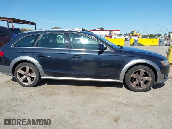 2014 Audi allroad A4 Premium Plus z VIN WA1UFAFL1EA151304, wystawiony jako IAAI lot #42387022 z przebiegiem 98 225 mil mil oraz . Historia ofert i sprzedaży dostępna na DreamBid. Obrazek 13.