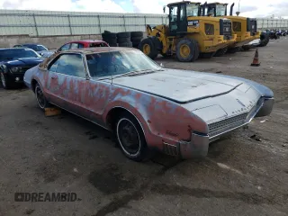 1967 Oldsmobile Toronado with VIN 396877N610043, listed as a Copart auction lot 79516854 with 242,595 mi miles and Clean Title. Bid and sale history available at DreamBid. Image 4.