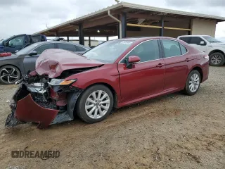 2019 Toyota Camry LE with VIN 4T1B11HKXKU779304, listed as a Copart auction lot 47935945 with 59,277 mi miles and Salvage Title. Bid and sale history available at carsss.com. Image 1.