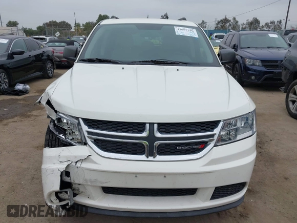 2014 Dodge Journey American Value with VIN 3C4PDCAB8ET141803, listed as a IAAI auction lot 42097292 with 76,339 mi miles and . Bid and sale history available at DreamBid. Image 12.