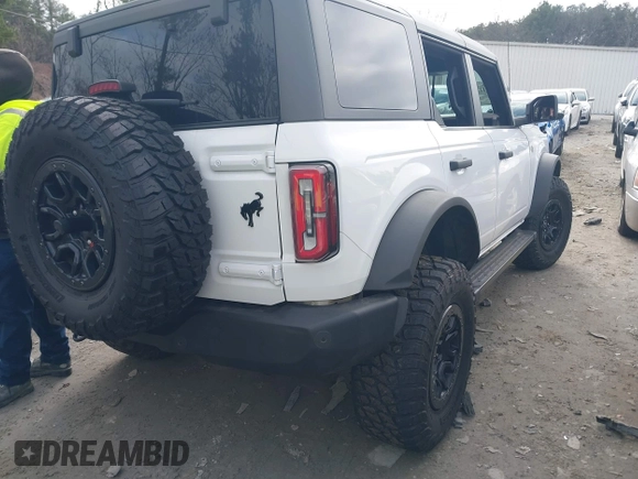 2023 Ford Bronco with VIN 1FMEE5DP7PLB52177, listed as a IAAI auction lot 41144697 with 70,148 mi miles. Bid and sale history available at carsss.com. Image 4.