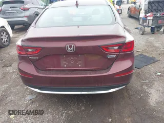 2020 Honda Insight Touring z VIN 19XZE4F93LE010040, wystawiony jako IAAI lot #42240572 z przebiegiem 52 299 mil mil oraz . Historia ofert i sprzedaży dostępna na DreamBid. Obrazek 16.