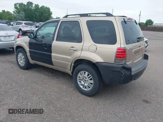 2007 Mercury Mariner Luxury with VIN 4M2YU91187KJ14159, listed as a IAAI auction lot 42576802 with 166,027 mi miles and . Bid and sale history available at DreamBid. Image 3.