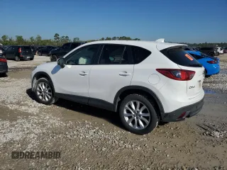 2015 Mazda CX-5 Grand Touring with VIN JM3KE2DY1F0453386, listed as a Copart auction lot 50580185 with 174,309 mi miles and Salvage Title. Bid and sale history available at carsss.com. Image 2.