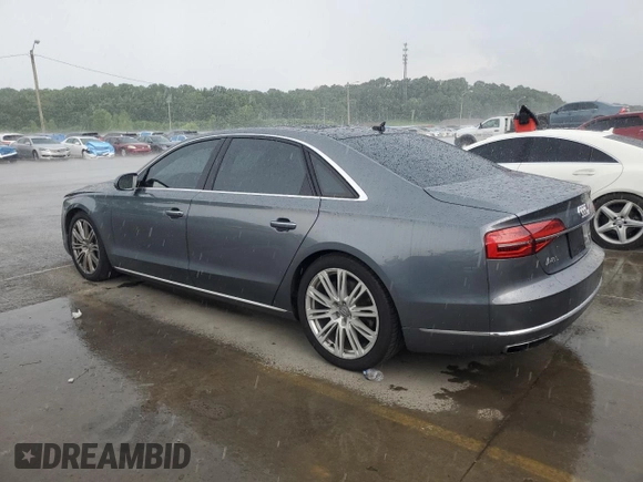 2016 Audi A8 3.0T с VIN WAU34AFD2GN001811, выставлен на аукционе Copart как лот 62304935 с пробегом 76 161 миль миль и Списание • Salvage title. История ставок и продаж доступна на DreamBid. Изображение 2.
