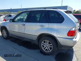 2005 BMW X5 3.0i with VIN 5UXFA13575LY00111, listed as a IAAI auction lot 42084755 with 167,167 mi miles. Bid and sale history available at carsss.com. Image 3.