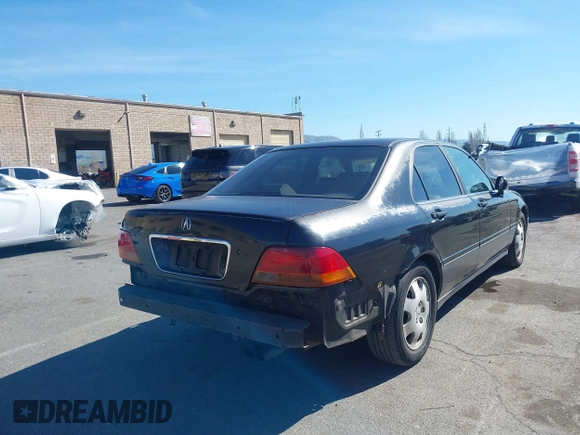 1998 Acura RL Special Edition with VIN JH4KA9686WC009959, listed as a IAAI auction lot 41632413 with 130,788 mi miles. Bid and sale history available at carsss.com. Image 4.
