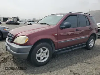 1999 Mercedes-Benz M 320/430/500 with VIN 4JGAB54E7XA099742, listed as a Copart auction lot 53672645 with 167,750 mi miles and Clean Title. Bid and sale history available at DreamBid. Image 1.