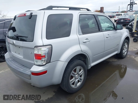 2008 Mercury Mariner with VIN 4M2CU81148KJ26119, listed as a IAAI auction lot 42189605 with 144,816 mi miles and . Bid and sale history available at DreamBid. Image 4.