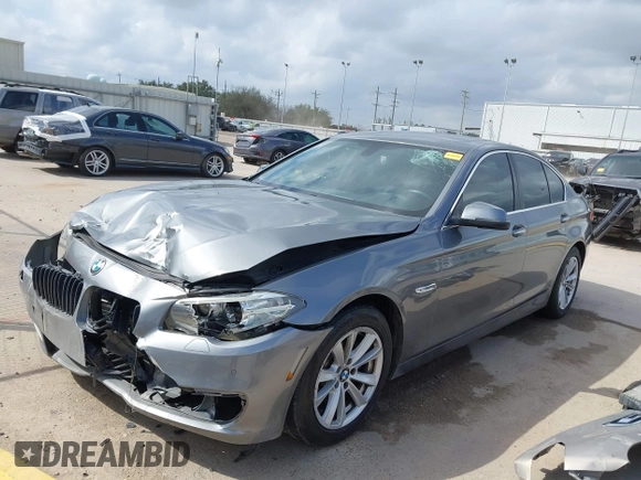 2014 BMW 5 Series 528i with VIN WBA5A5C52ED500696, listed as a IAAI auction lot 41708462 with 121,592 mi miles. Bid and sale history available at carsss.com. Image 2.