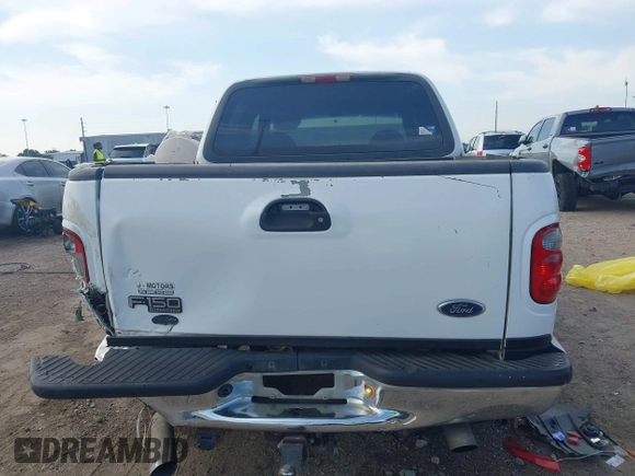 2001 Ford F-150 XLT with VIN 1FTRW07L81KE91672, listed as a IAAI auction lot 42021661 with 200,000 mi miles and . Bid and sale history available at DreamBid. Image 16.