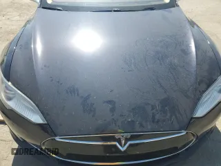2014 Tesla Model S 60 с VIN 5YJSA1S13EFP29202, выставлен на аукционе Copart как лот 59046255 с пробегом Не указан миль и Списание • Salvage title. История ставок и продаж доступна на DreamBid. Изображение 11.