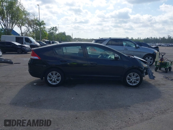 2010 Honda Insight EX with VIN JHMZE2H76AS000837, listed as a IAAI auction lot 42103333 with 146,576 mi miles and . Bid and sale history available at DreamBid. Image 13.