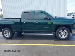 2014 Chevrolet Silverado 1500 LT with VIN 1GCRCREH2EZ323115, listed as a IAAI auction lot 42055949 with 61,337 mi miles and . Bid and sale history available at DreamBid. Image 13.
