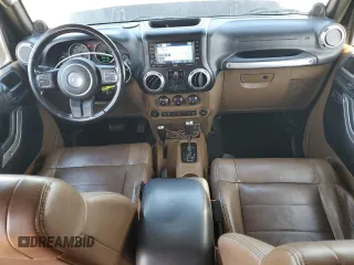 2012 Jeep Wrangler Unlimited Rubicon with VIN 1C4HJWFG9CL276753, listed as a Copart auction lot 62996995 with 234,159 mi miles and Clean title. Bid and sale history available at DreamBid. Image 8.
