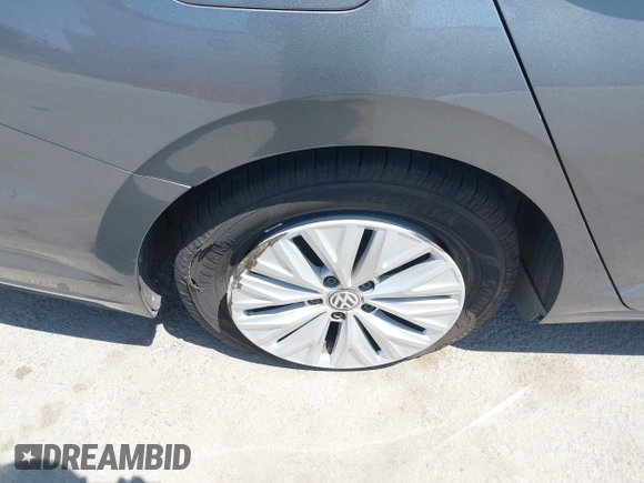 2019 Volkswagen Jetta S z VIN 3VWC57BUXKM074708, wystawiony jako IAAI lot #42151448 z przebiegiem 189 430 mil mil oraz . Historia ofert i sprzedaży dostępna na DreamBid. Obrazek 6.