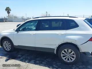 2019 Volkswagen Tiguan S with VIN 3VV1B7AX1KM101407, listed as a IAAI auction lot 42032761 with 51,868 mi miles. Bid and sale history available at carsss.com. Image 14.