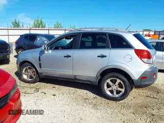 2012 Chevrolet Captiva Sport LS z VIN 3GNAL2EK0CS570909, wystawiony jako IAAI lot #42173042 z przebiegiem 185 044 mil mil oraz . Historia ofert i sprzedaży dostępna na DreamBid. Obrazek 14.