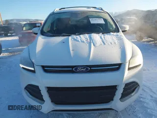 2016 Ford Escape Titanium with VIN 1FMCU9J94GUC81270, listed as a IAAI auction lot 41502724 with 128,161 mi miles. Bid and sale history available at carsss.com. Image 12.