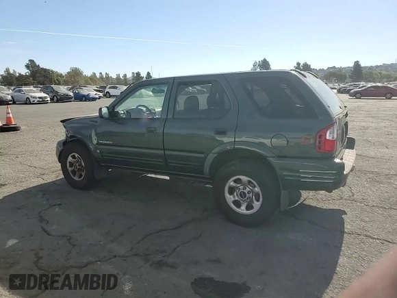2004 Isuzu Rodeo S with VIN 4S2CK58W344303242, listed as a Copart auction lot 75339714 with 106,659 mi miles and Salvage title. Bid and sale history available at DreamBid. Image 11.