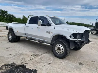 2015 Ram 3500 Laramie with VIN 3C63RRJL2FG661749, listed as a Copart auction lot 71062544 with 126,775 mi miles and Salvage Title. Bid and sale history available at carsss.com. Image 4.