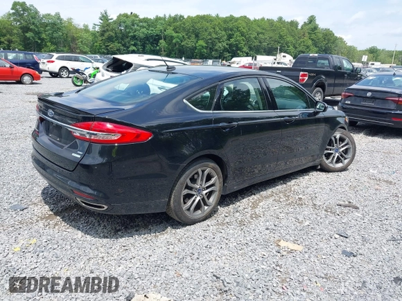2017 Ford Fusion SE with VIN 3FA6P0H98HR331628, listed as a IAAI auction lot 42730977 with 47,248 mi miles and . Bid and sale history available at DreamBid. Image 4.