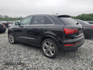 2017 Audi Q3 Prestige with VIN WA1GCCFS7HR001163, listed as a Copart auction lot 58800655 with 52,034 mi miles and Salvage title. Bid and sale history available at DreamBid. Image 2.