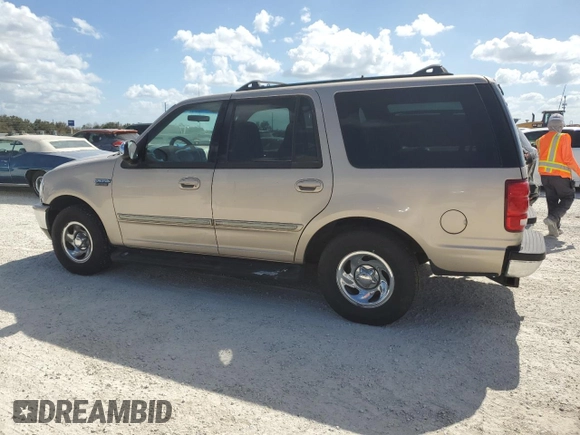 1997 Ford Expedition XLT with VIN 1FMEU17L7VLB84516, listed as a Copart auction lot 76664984 with 269,040 mi miles and Salvage title. Bid and sale history available at DreamBid. Image 2.