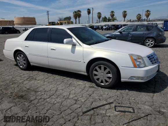 2006 Cadillac DTS 1SB z VIN 1G6KD57Y36U144765, wystawiony jako Copart lot #50603475 z przebiegiem 105 637 mil mil oraz Czysty tytuł • Clean title. Historia ofert i sprzedaży dostępna na DreamBid. Obrazek 4.