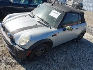 2006 MINI Convertible with VIN WMWRF33586TF64534, listed as a IAAI auction lot 41484453 with 180,748 mi miles and . Bid and sale history available at DreamBid. Image 2.
