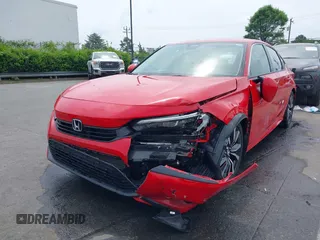 2024 Honda Civic EX z VIN 2HGFE1F77RH328841, wystawiony jako IAAI lot #42085858 z przebiegiem 31 636 mil mil oraz . Historia ofert i sprzedaży dostępna na DreamBid. Obrazek 6.