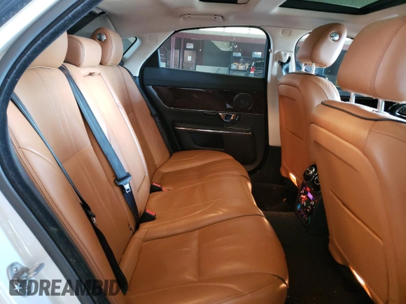 2016 Jaguar XJ R-Sport with VIN SAJWJ1CD1G8V92615, listed as a Copart auction lot 79531373 with 108,166 mi miles and . Bid and sale history available at DreamBid. Image 10.