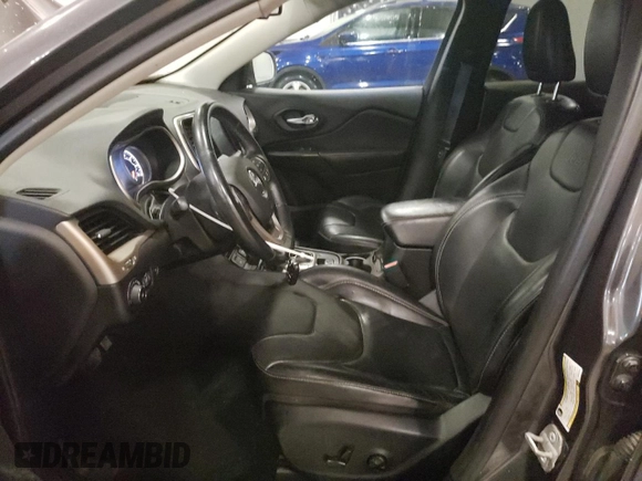 2014 Jeep Cherokee Limited with VIN 1C4PJLDS9EW241374, listed as a Copart auction lot 61048025 with 77,697 mi miles and Salvage title. Bid and sale history available at DreamBid. Image 7.