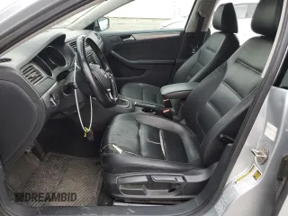 2015 Volkswagen Jetta SE with VIN 3VWD17AJ5FM260475, listed as a Copart auction lot 84764864 with 119,189 mi miles and Salvage title. Bid and sale history available at DreamBid. Image 7.